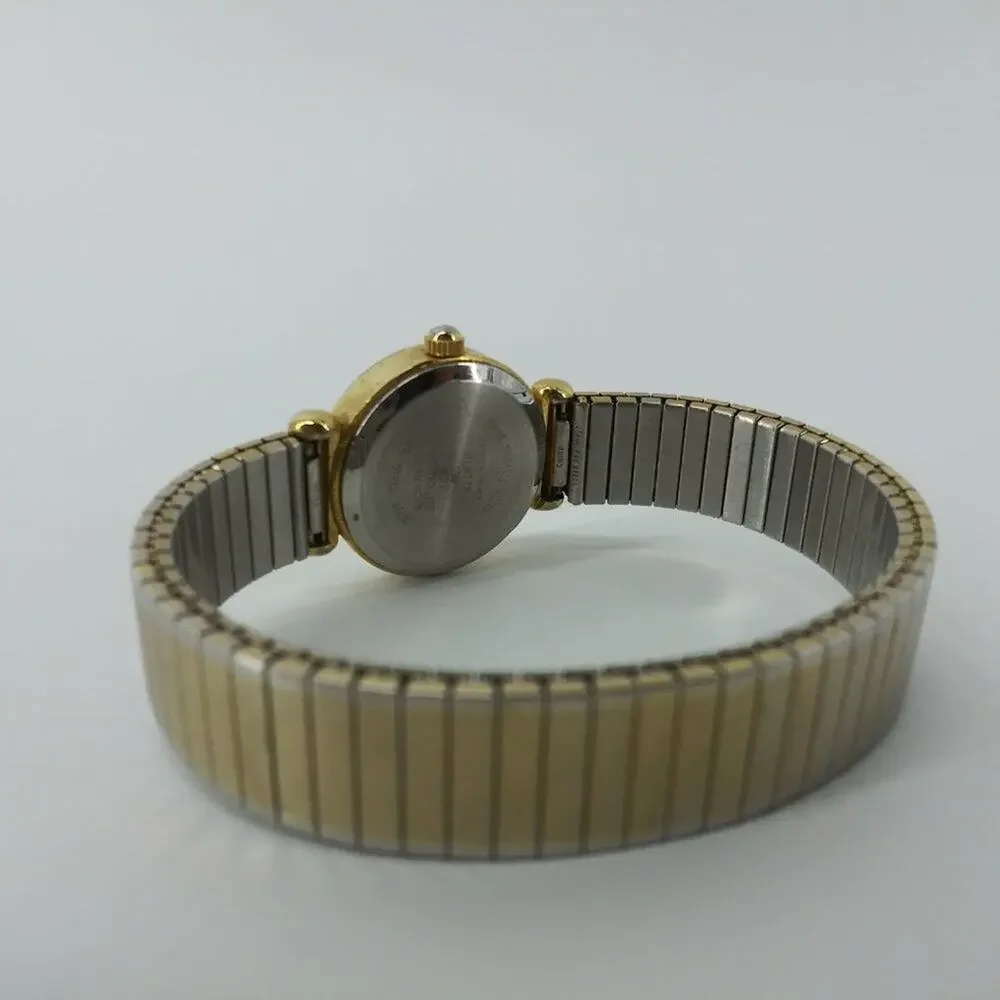 Vintage Milan Womens Gold Tone Stretch Bracelet Wristwatch with Rhinestones